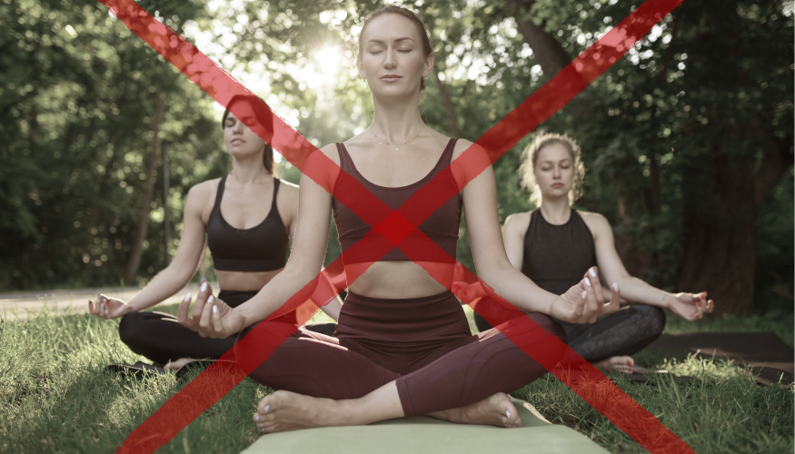 Women meditating outdoors crossed out